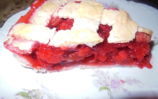 Sweet strawberries and tart rhubarb make a ruby red delicious pie.